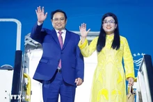 Le Premier ministre Pham Minh Chinh et son épouse. Photo: VNA