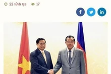 Le site Web de l'Académie royale du Cambodge (RAC) a publié les 4 et 5 novembre un article, mettant en vedette la visite du chef du gouvernement vietnamien. Photo : capture d'écran/VNA.