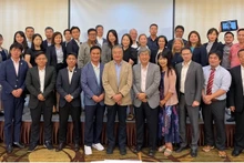 Des délégués lors de la conférence au Vietnam de l’Association mondiale des nouilles instantanées. Photo : NDEL.