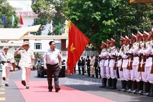 Le Premier ministre Pham Minh Chinh rend visite à la Police provinciale de Dak Lak. Photo : VNA.