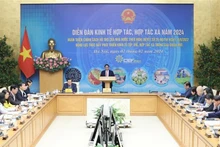 Le Premier ministre Pham Minh Chinh s'adresse au Forum sur l’économie collective et coopérative de 2024, à Hanoi, le 2 février. Photo: VNA