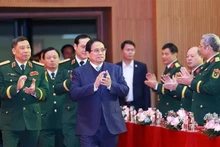 Le Premier ministre Pham Minh Chinh à l'Académie de la Défense. Photo : VNA.