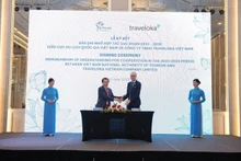 L'ANT du Vietnam et Traveloka ont signé un protocole d'accord pour renforcer les partenariats public-privé en faveur du développement durable du secteur touristique vietnamien. Photo : VNA.