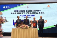 La cérémonie de signature entre WLP et les partenaires vietnamiens. Photo : VNA.