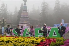Des visiteurs à Sa Pa, Lao Cai. Photo : VNA.