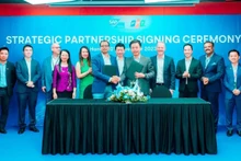 Cérémonie de signature de la coopération entre FPT et SAP, le 21 novembre à Hanoi. Photo : hanoimoi.com.vn