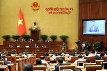 Le Premier ministre Pham Minh Chinh lors de la séance de questions-réponses de l’Assemblée nationale dans la matinée du 8 novembre. Photo : VNA.
