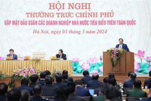 Le Premier ministre Pham Minh Chinh préside le 3 mars à Hanoï la Conférence de rencontre entre la Permanente du gouvernement et les entreprises publiques typique. Photo : VNA.
