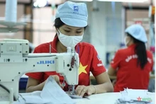 Le Vietnam vise plus de 45 milliards de dollars d'exportations de textile-habillement en 2022. Photo: qdnd.com.vn