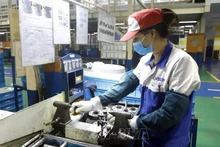 L’économie vietnamienne a enregistré des évènements positifs en 2022, reflétant sa stabilité et son développement. Photo : VNA.