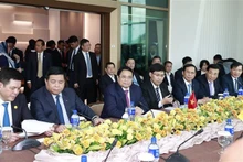 Le Premier ministre Pham Minh Chinh à une table ronde avec les entreprises énergétiques et pétrolières et gazières du Brunei, à Bandar Seri Begawan, le 11 février. Photo : VNA