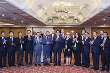 Le président Luong Cuong et lé délégués de l'Alliance des entreprises États-Unis – APEC. Photo : VNA.