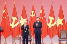 Le Secrétaire général Nguyên Phu Trong et le Secrétaire général et Président chinois Xi Jinping, lors de la cérémonie à Pékin, le 31 octobre. Photo : VNA .