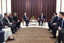 Le Premier ministre Pham Minh Chinh reçoit le deuxième ministre des Finances et de l’Économie du Brunei, Dato Seri Setia Dr Awang Haji Mohd Amin Liew Abdullah. Photo : VNA.