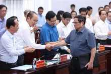 Le Premier ministre Pham Minh Chinh lors d’une séance de travail avec les autorités de Bac Liêu. Photo : VNA.