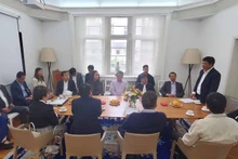 Rencontre entre Luong Nguyên Minh Triêt, président du Conseil populaire de la ville de Dà Nang et les les dirigeants des entreprises de Viêt kiêu en Allemagne. Photo : baoquocte.vn.
