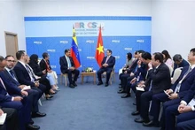 Le Premier ministre Pham Minh Chinh (à droite, au centre) et le président vénézuélien Nicolas Maduro à Kazan, en Russie. Photo : VNA.