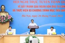 Le Premier ministre Pham Minh Chinh à la conférence nationale en ligne sur le décaissement. Photo : VNA