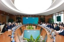 Des représentants de BIDV et de l'AFD lors d'une cérémonie de signature le 31 juillet. Photo : NDEL. 