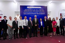Des invités lors du forum économique Vietnam - France 2023 intitulé « Vers un développement vert et durable », le 7 juillet à Hanoï. Photo : Tùng Chi/NDEL