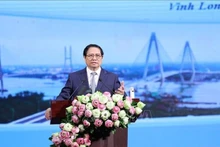 Le Premier ministre Pham Minh Chinh prend la parole lors de l’événement. Photo : VNA.