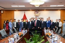 Délégués lors de la séance de travail. Photo: VNA.