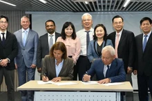 Signature du protocole d'accord entre le groupe industriel allemand Neuman&Esser et l'Institut de stratégie de développement économique numérique sur la coopération dans le domaine du développement de l'industrie de l'hydrogène au Vietnam. Photo : NDEL
