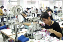 Au premier trimestre 2024, le chiffre d’affaires des exportations de textiles et d’habillement a atteint près de 8 milliards de dollars, soit une augmentation de 7,9 %. Photo : baodautu.vn