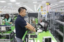 Dans l'usine de Samsung à Bac Ninh (Nord). Photo : VNA.