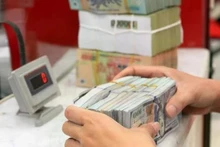 De devises étrangères vers Ho Chi Minh-Ville dépassent les 9,5 milliards de dollars en 2024. Photo: VNA