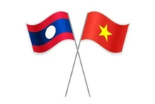 Les drapeaux du Laos et du Vietnam. Source : VGP.