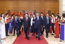 Le Président de l’Assemblée nationale (AN) de la République socialiste du Vietnam, Vuong Dinh Huê, et le Secrétaire général du Comité central du Parti communiste chinois (PCC) et Président de la République populaire de Chine, Xi Jinping. Photo : VNA.