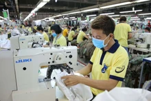 Le revenu des travailleurs en 2022 augmente de 16%. Photo : Nguoilaodong