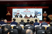 Le ministère de l'Industrie et du Commerce a organisé une conférence pour évaluer ses activités de l'année écoulée. Photo : Trân Viêt/AVI.