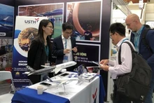 Un des stands au Salon international du réseau de production, d'approvisionnement et de consommation durables dans l'industrie aéronautique. Photo : VNA.