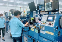 À Bac Giang, de nombreuses entreprises des parcs industriels envisagent de recruter en grand nombre, que ce soit des travailleurs hautement qualifiés et des ouvriers. Photo: baohaiphong