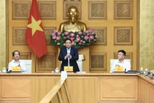 Le Premier ministre Pham Minh Chinh prend la parole lors de la réunion. Photo : NDEL.