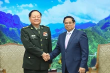 Le Premier ministre Pham Minh Chinh (droite) et le vice-président de la Commission militaire centrale de Chine, le général de corps d’armée Zhang Youxia, Photo : VNA.