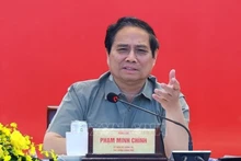 Le Premier ministre Pham Minh Chinh s’exprime lors de la séance de travail avec les autorités municipales et le Comité de pilotage 1568 chargé d’examiner et de traiter les obstacles liés à divers projets à Hô Chi Minh-Ville. Photo : VNA.
