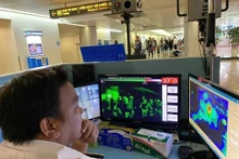 Le ministère de la Santé demande une surveillance plus stricte des maladies respiratoires aux postes frontaliers. Photo : thanhnien.vn