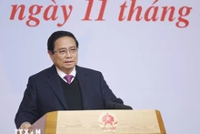 Le Premier ministre Pham Minh Chinh lors de la conférence. Photo : VNA.