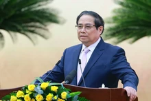 Le Premier ministre Pham Minh Chinh préside la conférence à Hô Chi Minh-Ville, le 4 janvier. Photo : VNA.