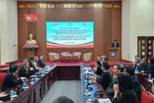 Séminaire "Passer en revue les 10 ans de partenariat intégral et mettre en œuvre le partenariat stratégique intégral Vietnam – Etats-Unis pour la paix, la coopération et le développement durable". Photo : VGP.