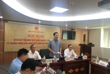 Lors du colloque afin d’évaluer les exportations du riz au premier trimestre et présenter les orientations pour la gestion des entreprises rizicoles. Photo: baodautu