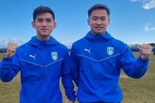 L'attaquant Vu Minh Hieu et le défenseur Nguyen Canh Anh. Photo: Naver Sports