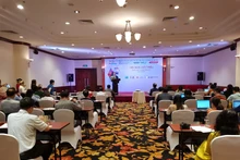 Conférence destinée à soutenir l’expansion vers l’étranger des petites et moyennes entreprises via le commerce électronique. Photo : Ngoc Quynh/Bnews/VNA.