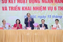 Le Premier ministre Pham Minh Chinh assiste ce samedi matin à une conférence du secteur bancaire. Photo : VNA