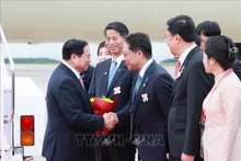 Cérémonie d'accueil du Premier ministre Pham Minh Chinh à Hiroshima (Japon). Photo: VNA