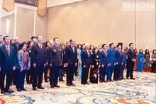 Des délégués lors de la cérémonie de célébration. Photo : Nhan Dan