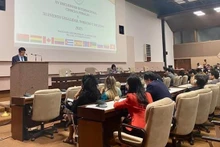 Le vice-président permanent du Parquet populaire suprême du Vietnam, Nguyên Huy Tiên, présente son intervention. Photo : VNA.